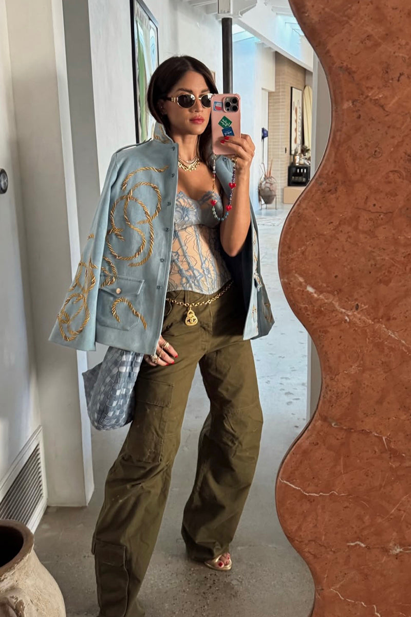 Nadya Shah Daley Denim Cargo Jacket shown in a stylish blue denim with multiple pockets and a classic cropped fit.