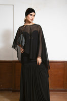 LEDIEL MYNA Cape jacket displayed on a hanger, showcasing its stylish design and fabric texture.