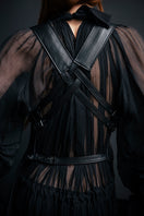 Vaska black leather vest with attached belt, stylish jacket featuring a sleek design and front closure.