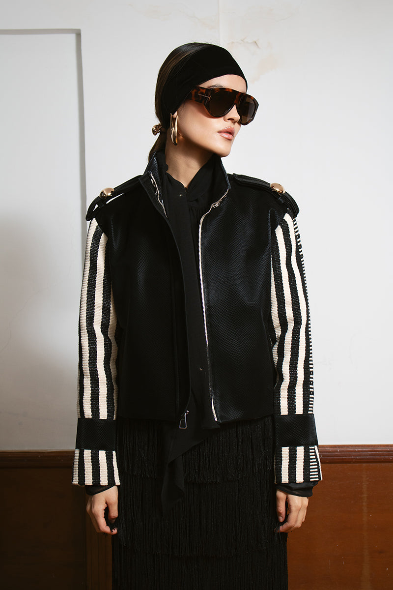 LEDIEL HAMACA jacket displayed on a hanger, showcasing its stylish design and fabric texture.