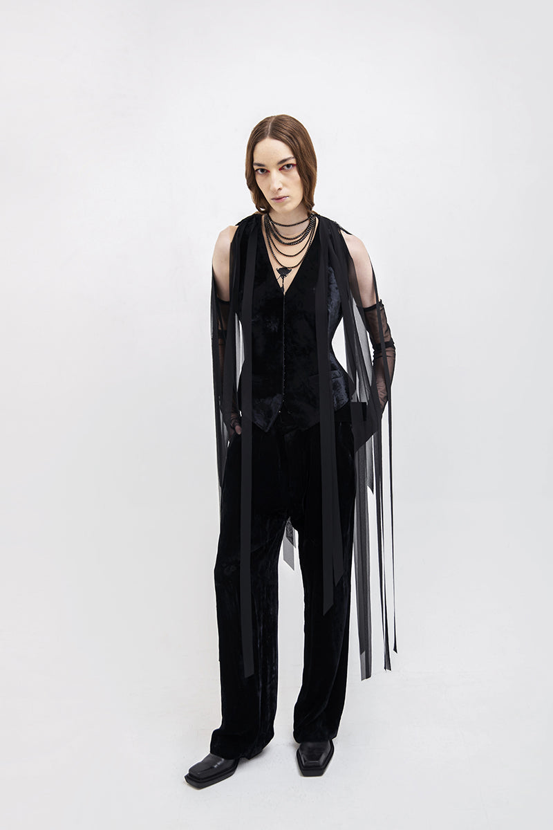 Black Vaska jacket featuring chiffon ribbons, stylish and elegant, shown with a front view highlighting the detailed design.