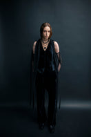 Black Vaska jacket with chiffon ribbons, stylish women's outerwear featuring elegant fabric and detailed design.