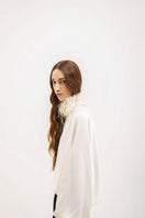 Beige Vaska feather-embellished blouse with long sleeves, stylish and elegant shirt for women.