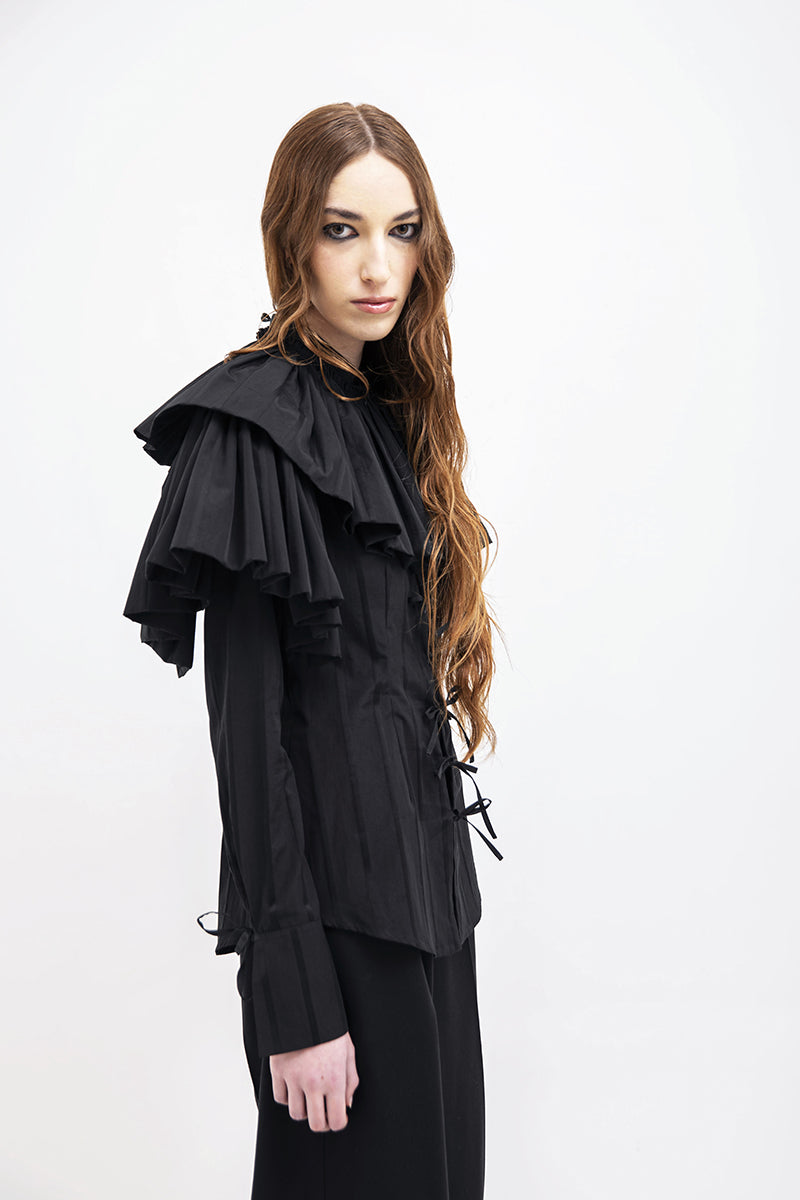 Vaska black shirt with a large collar, stylish casual top featuring a bold collar design in the image.