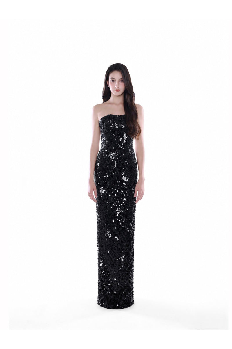 Black Luna cape gown by HACCHIC COUTURE, featuring elegant maxi dress with flowing cape detail and sophisticated design.