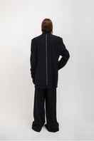 Black oversized blazer by Vaska with intricate beaded embroidery, stylish jacket perfect for fashion-forward outfits.