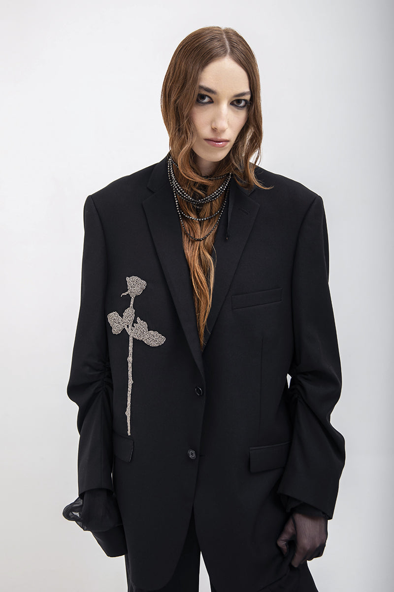 Black oversized blazer by Vaska featuring intricate beaded embroidery, stylish and elegant jacket for modern fashion.