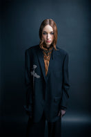 Black oversized blazer by Vaska with intricate beaded embroidery, stylish jacket perfect for modern fashion statements.