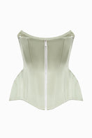 Light-green Irma corset top by Balykina, showcasing fitted design with lace-up front and stylish details.