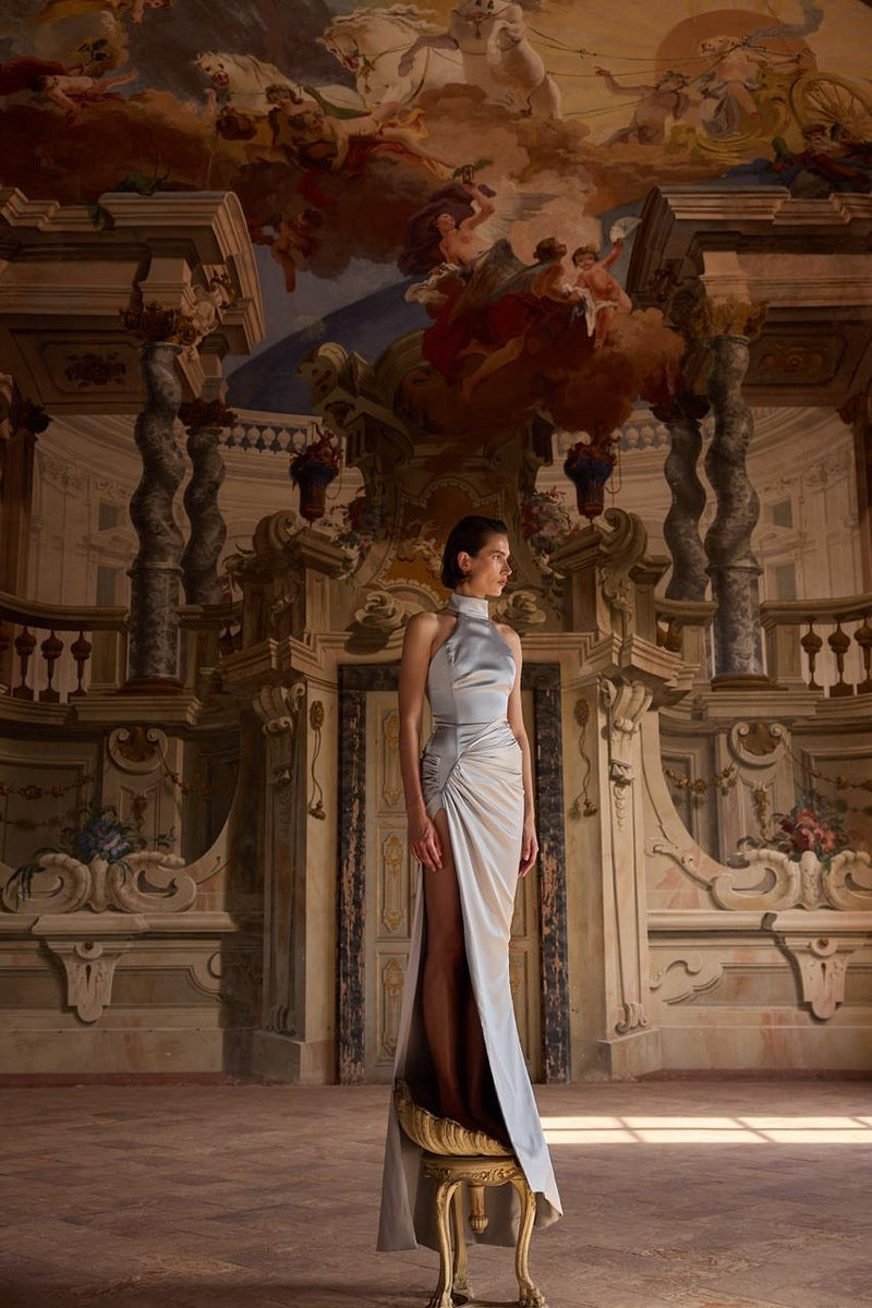 Gray ERA gown by Balykina displayed on a hanger, showcasing elegant fabric and classic design.