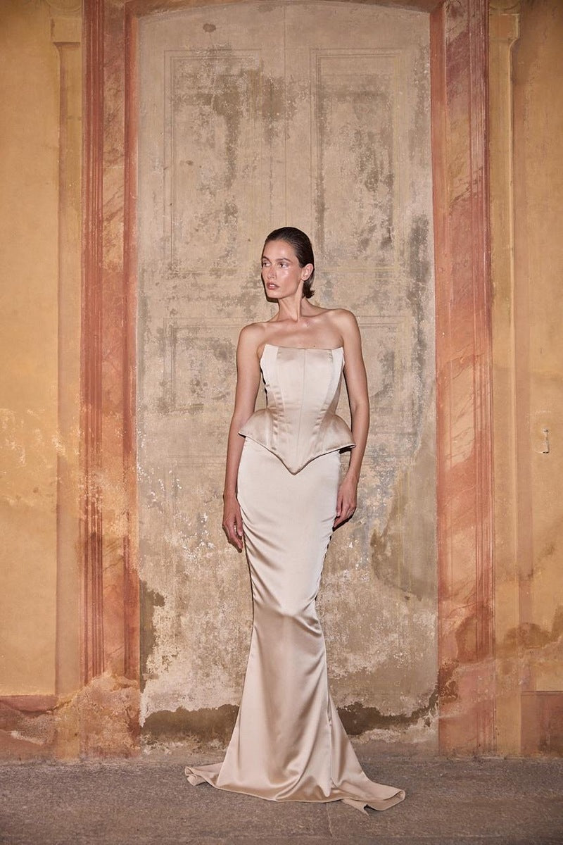Beige EVA corset top by Balykina featuring structured design and adjustable straps, shown on a model.