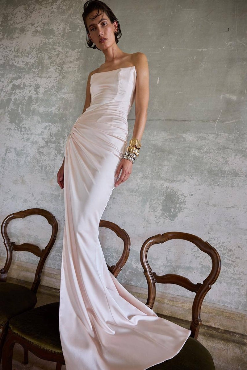 Blush pink Fiori gown by Balykina featuring elegant fabric and flowing design, perfect for formal occasions.