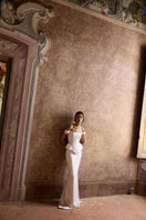 Soft blush pink satin maxi skirt by Balykina, flowing and elegant with smooth fabric and a stylish, feminine silhouette.