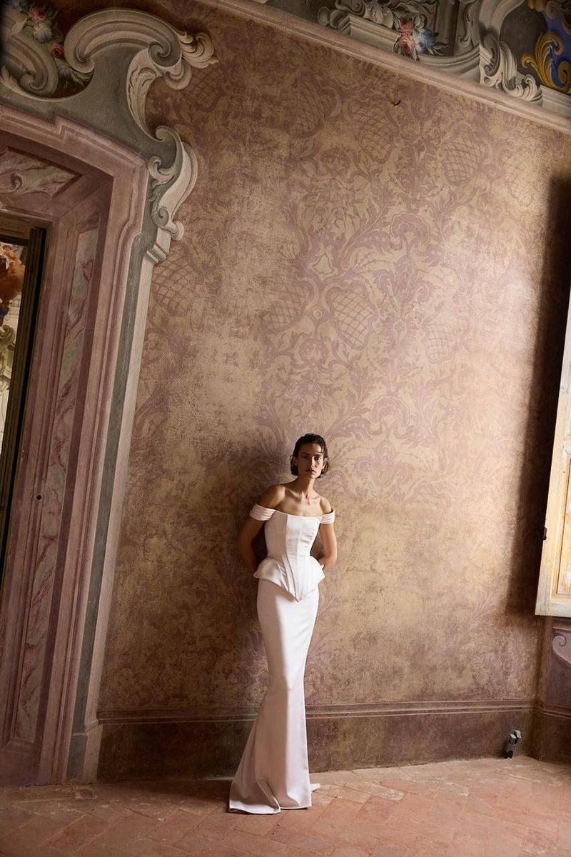 Soft blush pink satin maxi skirt by Balykina, flowing and elegant with smooth fabric and a stylish, feminine silhouette.