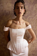 Blush pink EVA corset top by Balykina featuring a fitted design with adjustable straps and a stylish modern look.