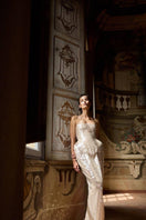 Elegant BALYKINA MUNA gown with intricate lace details and flowing fabric, perfect for formal occasions.