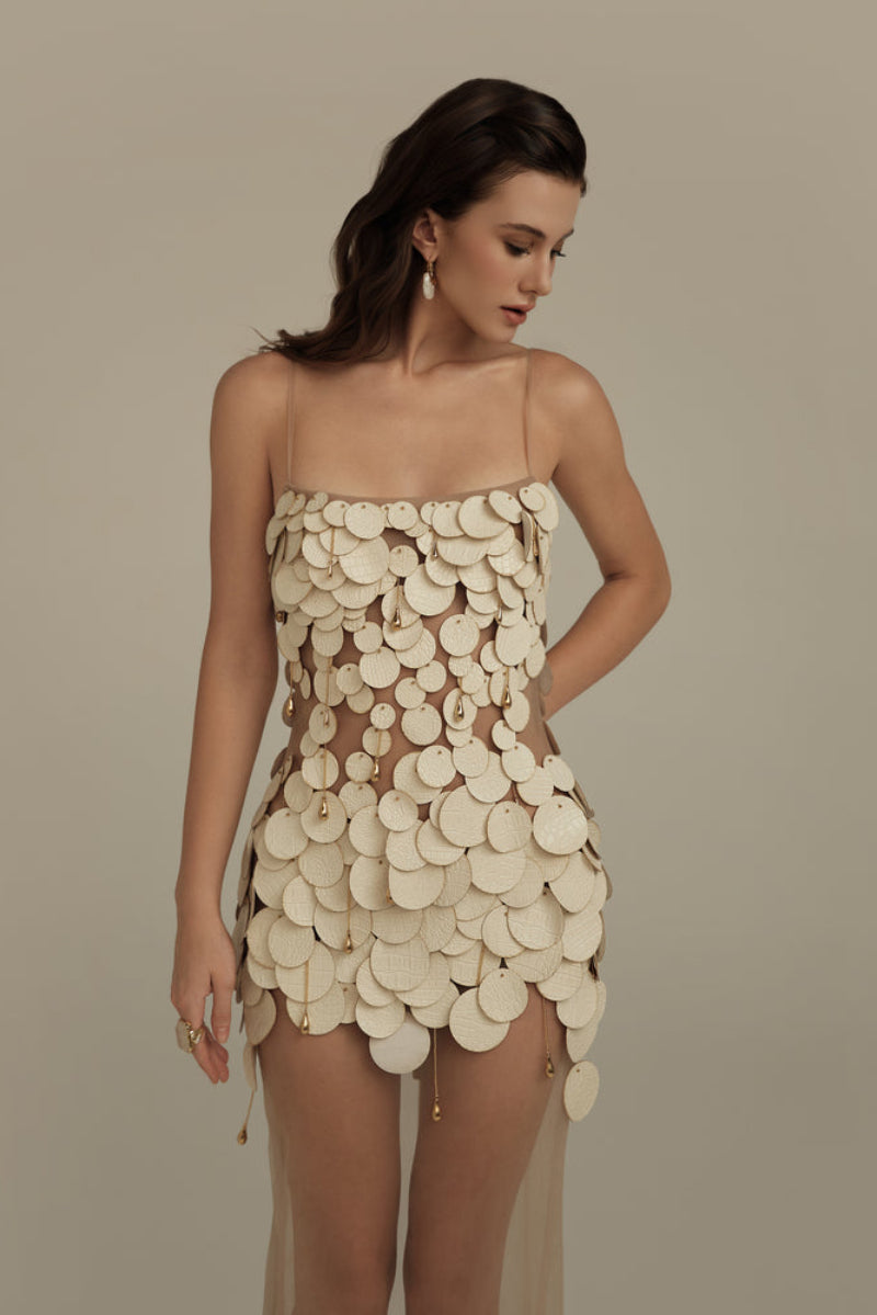 Cream white Seraphina maxi dress by POEM, featuring flowing fabric and elegant design, perfect for summer or special occasions.