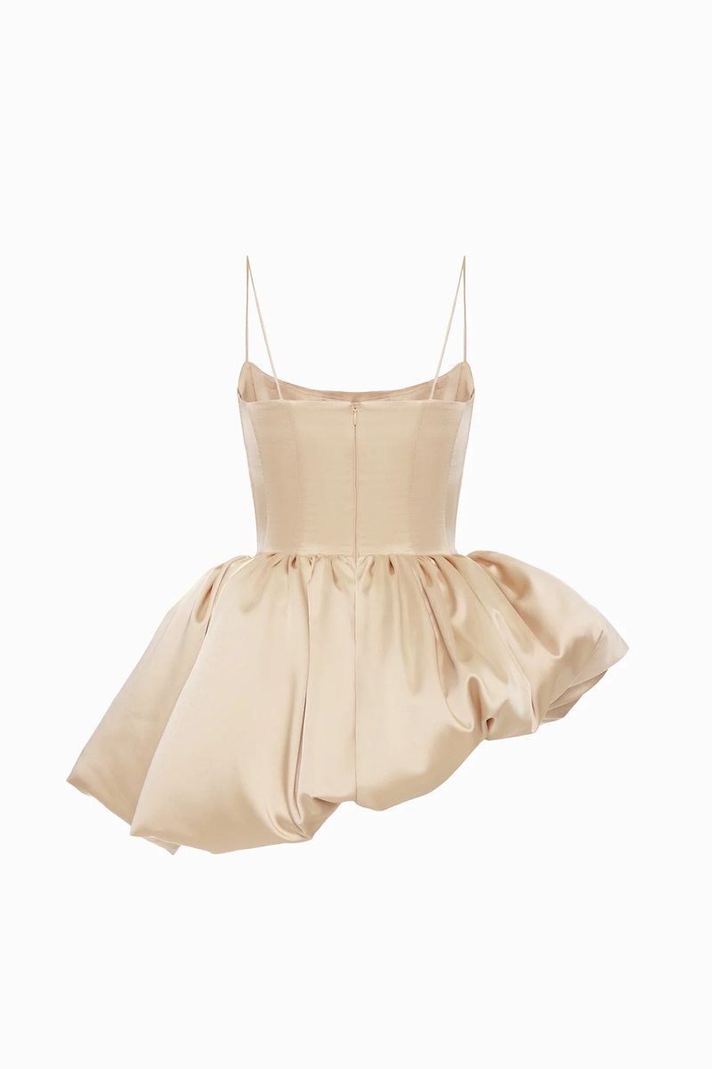 Beige mini dress by Balykina, featuring a stylish fit and elegant design, shown on a model in the image.