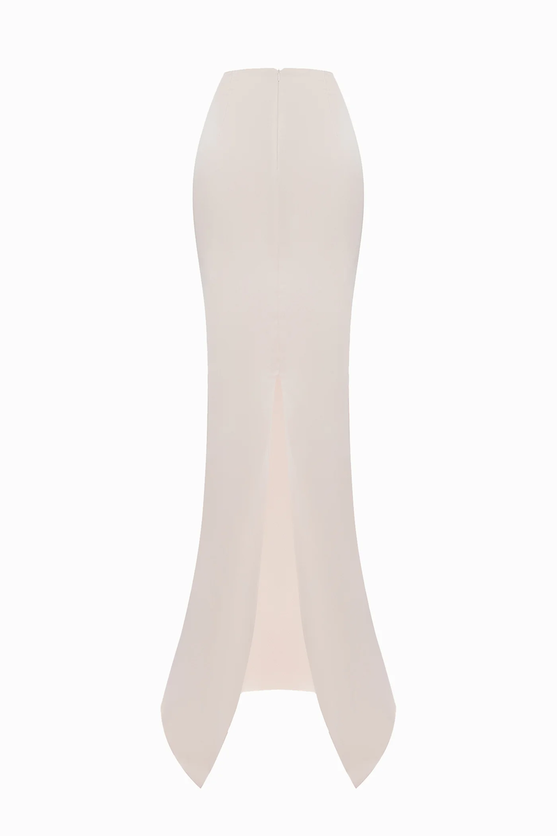 Soft blush pink satin maxi skirt by Balykina, flowing and elegant with a smooth satin finish, perfect for stylish occasions.