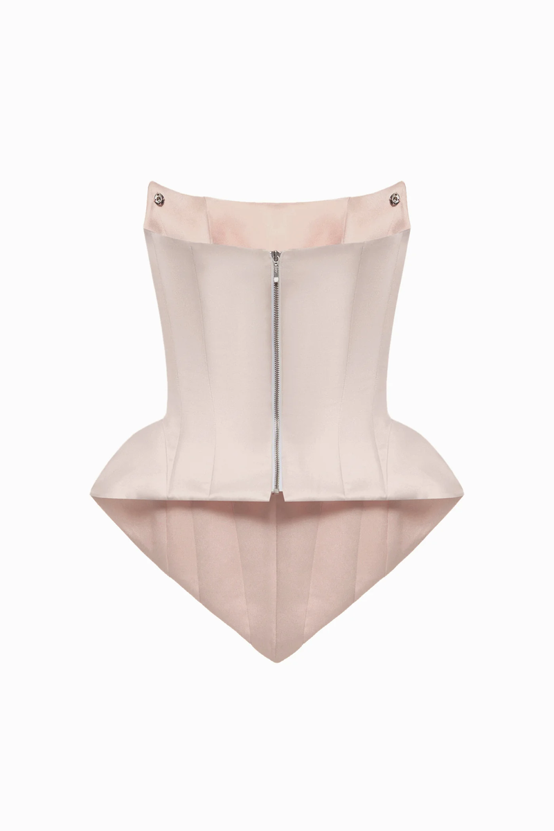 Blush pink EVA corset top by BALYKINA featuring a fitted design and stylish detailing.