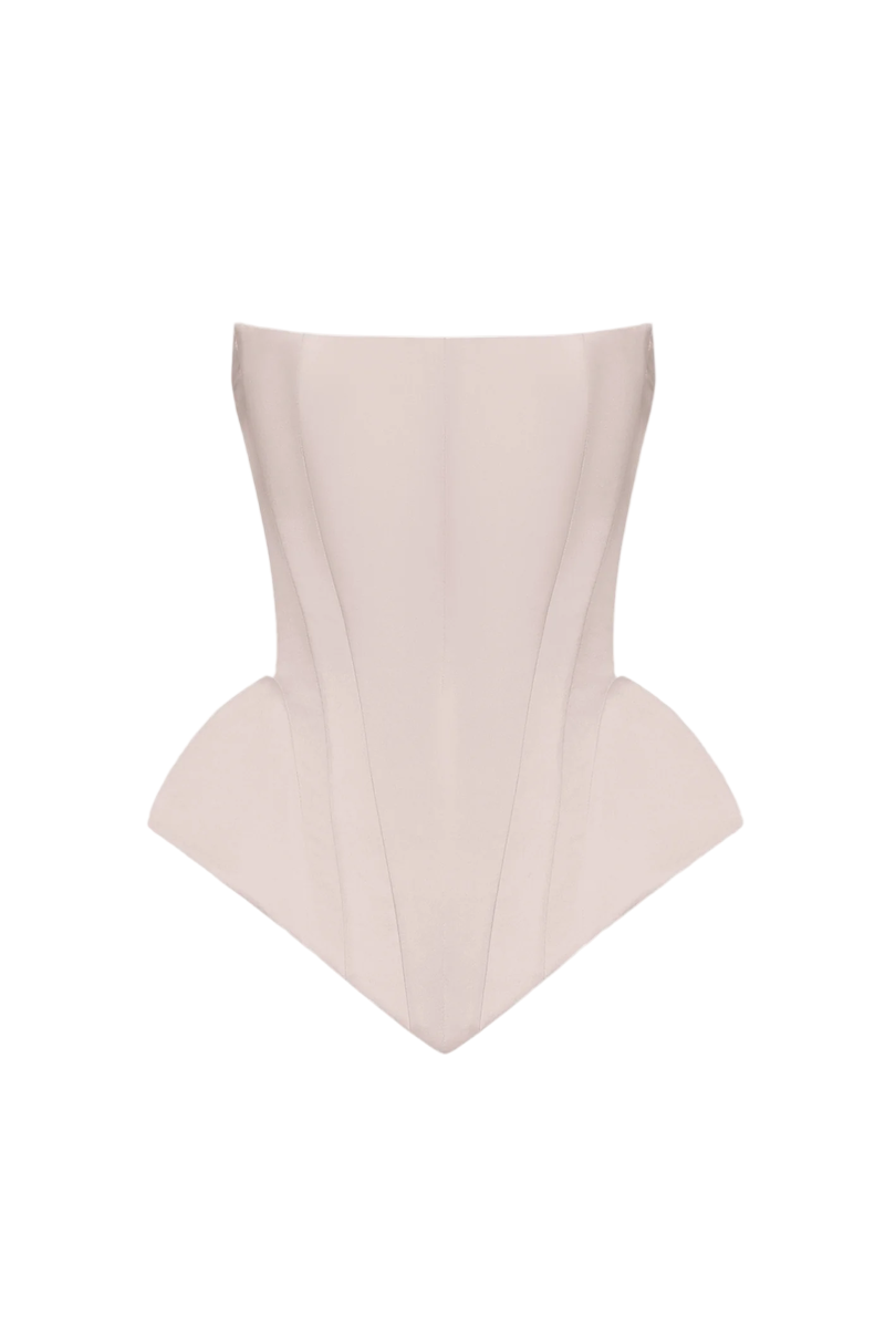 Blush pink EVA corset top by BALYKINA featuring a fitted design and adjustable straps, styled for a modern, trendy look.