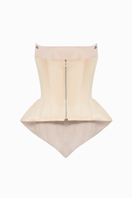 Beige EVA corset top by BALYKINA, featuring a structured design and adjustable straps, displayed on a neutral background.