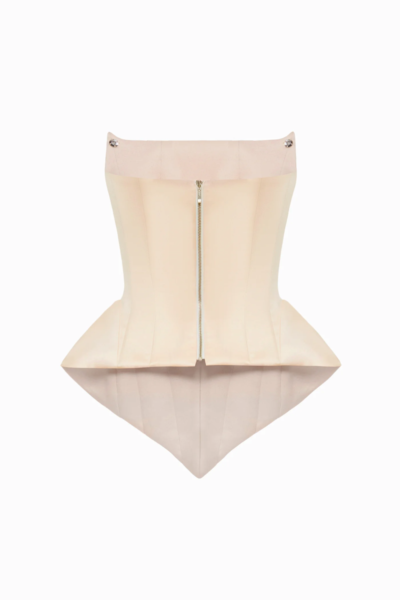 Beige EVA corset top by BALYKINA, featuring a structured design and adjustable straps, displayed on a neutral background.