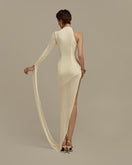 White POEM Hyperion maxi dress displayed on a hanger, showcasing its elegant flowing fabric and stylish design.