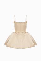 Beige Balykina Saris mini dress displayed on a hanger, showcasing its stylish design and fabric details.