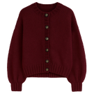 First Born Knits Frenchie cardigan in soft knit, featuring a cozy, stylish design with a button-up front and ribbed cuffs.