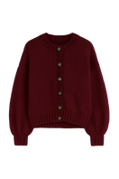 First Born Knits Frenchie cardigan in soft knit, featuring a cozy, stylish design with a button-up front and ribbed cuffs.