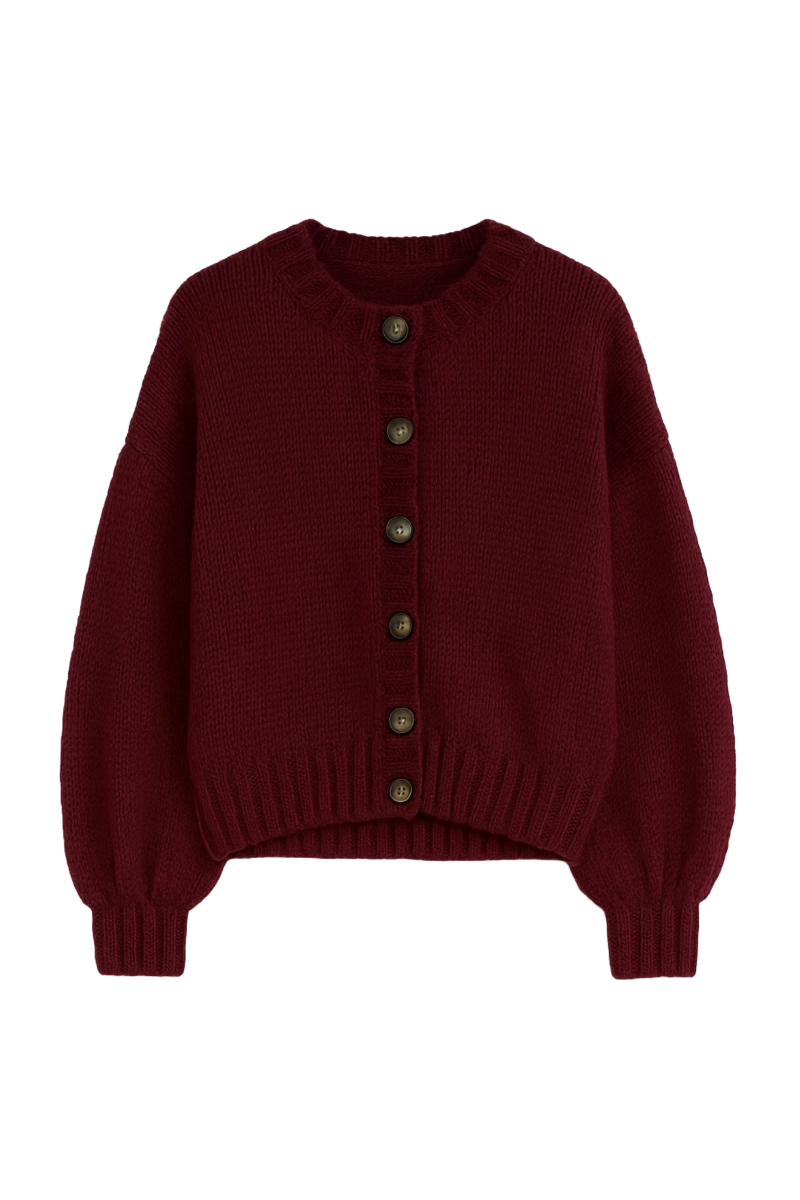 First Born Knits Frenchie cardigan in soft knit, featuring a cozy, stylish design with a button-up front and ribbed cuffs.