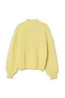 First Born Knits shell sweater featuring a cozy, textured design in soft, neutral colors.