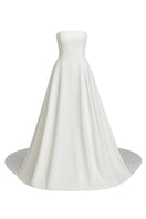 Elegant BALYKINA Gabby matte silk gown displayed on a mannequin, featuring a flowing design and sophisticated style.