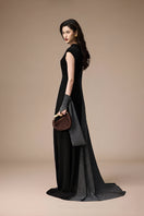 Jenny K Tran Stardust gown in black and silver glitter with a flowing gown design, perfect for elegant occasions.