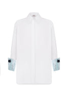 Nué mirror shirt, stylish button-up shirt with reflective mirror accents, displayed on a model.
