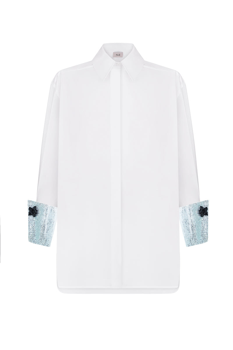 Nué mirror shirt, stylish button-up shirt with reflective mirror accents, displayed on a model.