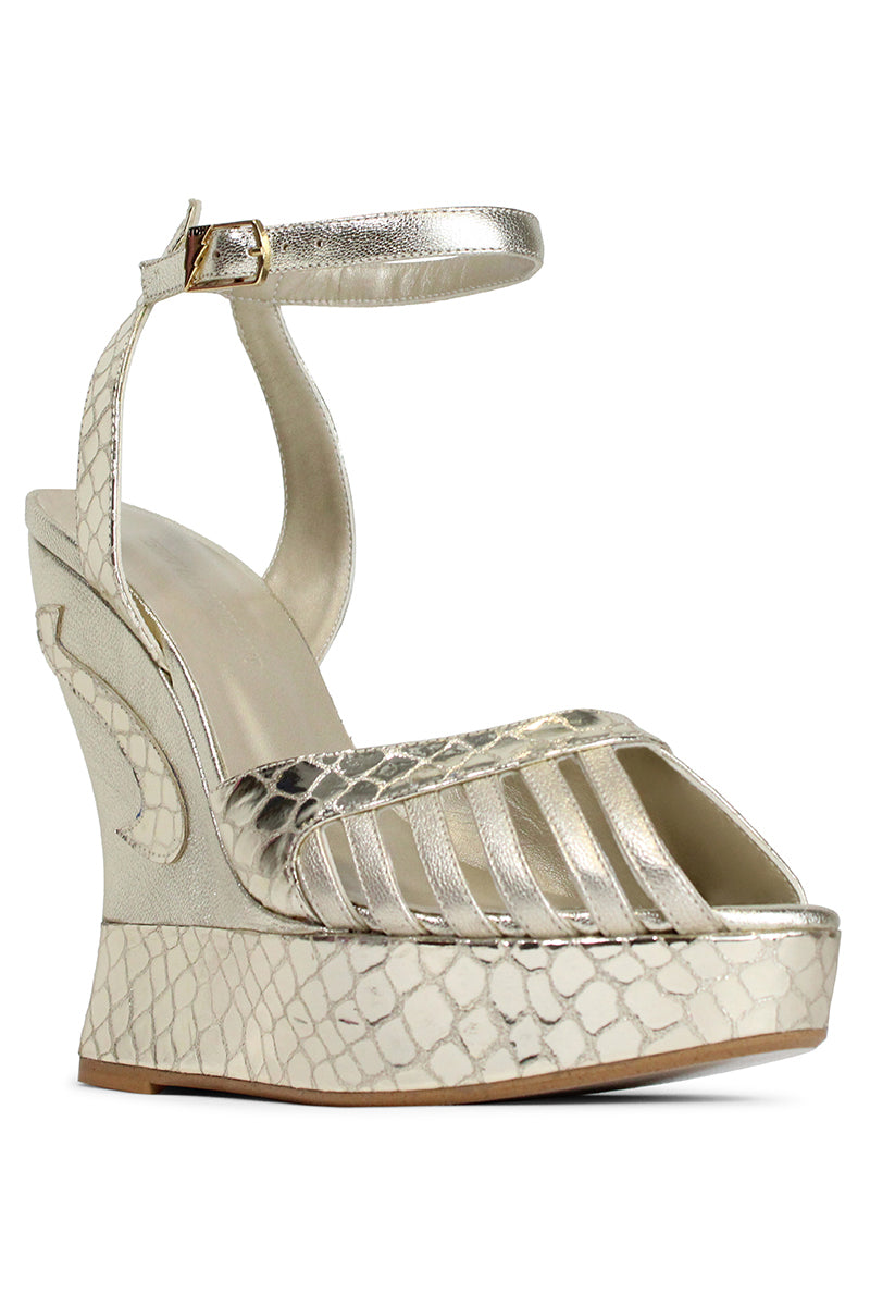 Terry de Havilland Margaux Gold Heels featuring elegant strappy design and metallic gold finish on a stylish women's footwear.