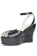 Black Margaux mid heels by Terry de Havilland, featuring elegant design and sleek silhouette, perfect for stylish occasions.