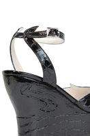 Black Margaux mid heels by Terry de Havilland, showcasing sleek design and elegant heel height, perfect for stylish occasions.