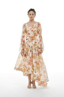 BY HAÓ AUREA asymmetric maxi dress in multi with flowing fabric and vibrant pattern, full-length style perfect for elegant occasions.