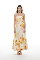 BY HAÓ ELYSIA strapless maxi dress in multi-color fabric, flowing design, showcased on a model.