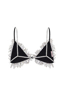 Nué Desirée Triangle Bra showing soft pink fabric and delicate lace details, designed for comfortable, stylish everyday wear.