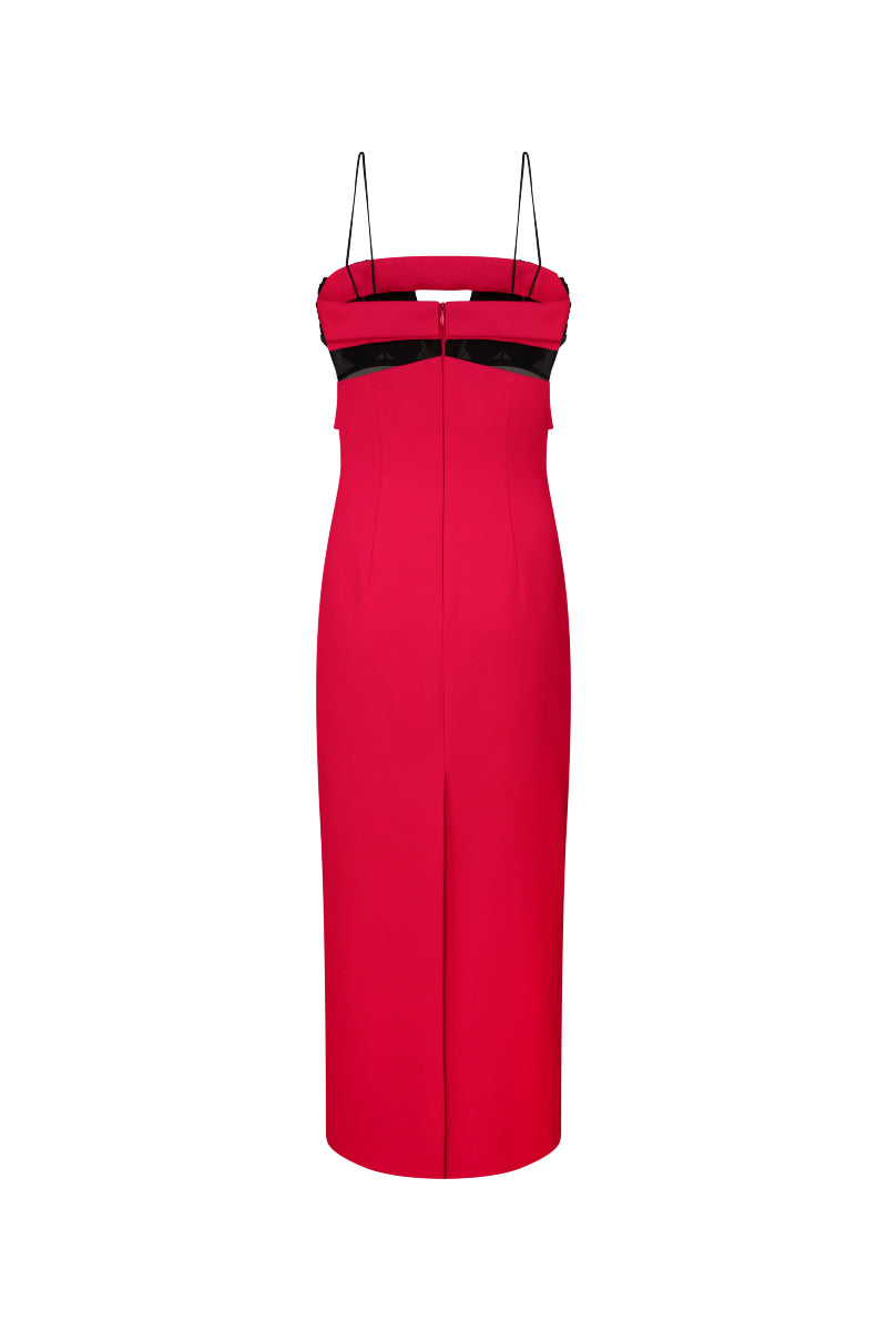 Nué Paloma midi dress displayed on a hanger, showcasing its elegant fabric and stylish design.