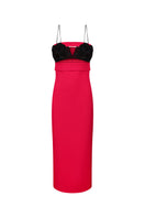 Nué Paloma midi dress displayed flat with soft fabric and elegant design, perfect for stylish occasions.