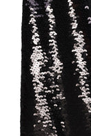 Nué Bare Black Sequin Gown featuring a fitted silhouette and elegant design, perfect for formal occasions.