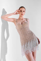 Beaded fringe mini dress by Monika Dimova featuring intricate beadwork and fringe details, perfect for stylish evening wear.