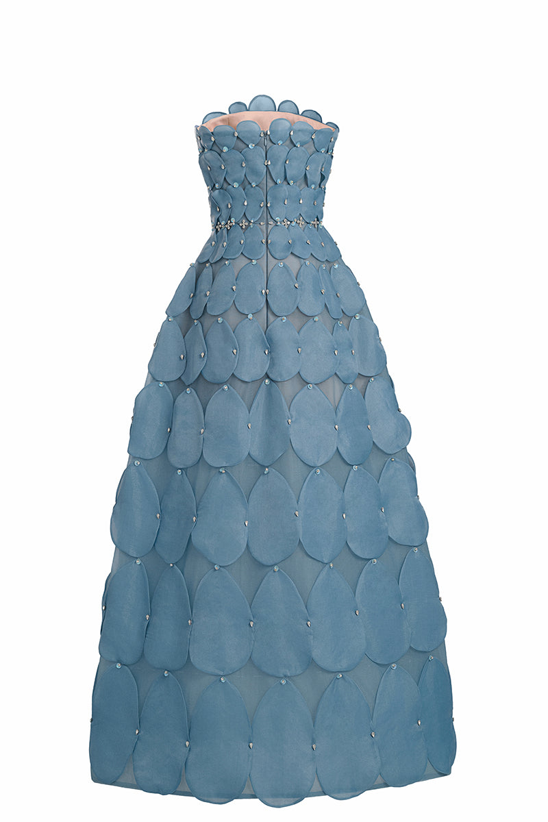 Blue 3D petal sculpture maxi gown by Happy Clothing, featuring intricate floral detailing and flowing fabric design.