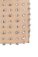 Nué Chantal mini skirt in black, showcasing its fitted design and stylish length, perfect for casual or dressy outfits.
