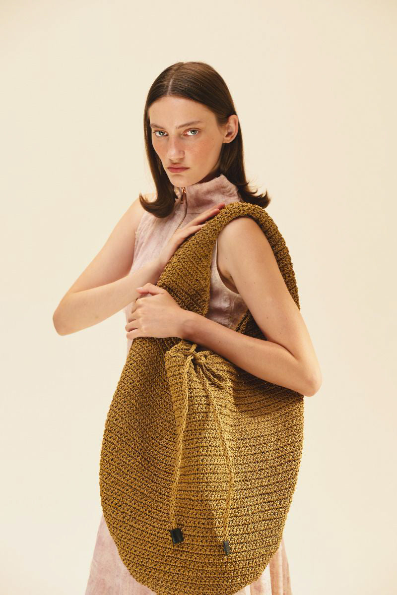 Beige SIRENE shoulder bag by VIKELE STUDIO, featuring a stylish design and smooth leather finish.